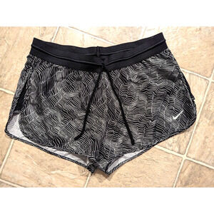 Nike women sz M Dri Fit Run Fast Running Shorts lined black white 904889 2570